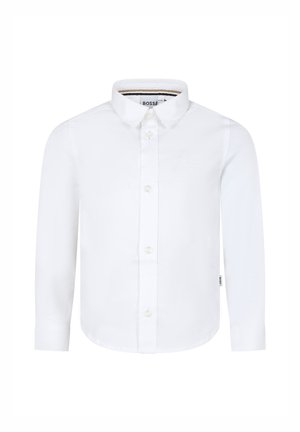 Chemise blanche à manches longues avec col boutonné, présentant un subtil logo brodé et une fermeture à boutons standard. Tissu en coton lisse.