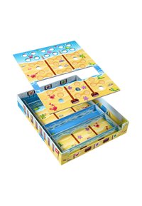 Beach-themed board game box with colorful sea creatures and hole-punched game boards stacked inside it.
