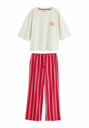 Crèmekleurige top met korte mouwen met de tekst ""Happy Holidays"", gecombineerd met losse rood-wit-groene gestreepte broek met elastische tailleband.