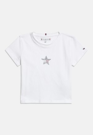 White short-sleeve toddler t-shirt with a dotted star design in red, white, and blue on the front and a small flag logo on the sleeve.