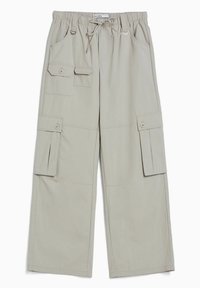 Bežové cargo kalhoty s pasem na šňůrku, bočními a předními kapsami a rovnými nohavicemi. Vyrobeny z lehkého materiálu s minimální texturou.