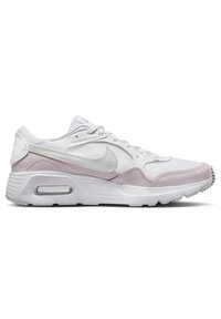 Baskets Nike blanches avec une tige texturée et des accents roses, une semelle rembourrée et une unité Air visible au niveau du talon pour plus de confort.