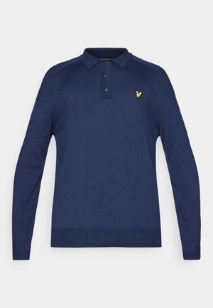 Navy blue long-sleeve polo shirt with ribbed texture, three-button placket, and a small gold logo accent on the chest.