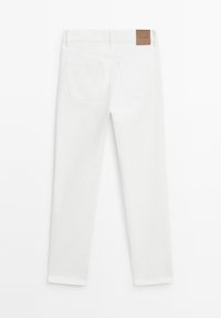 White denim pants with a straight cut, featuring a brown leather label on the waistband and two back pockets. Smooth texture and solid color.