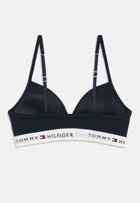 Námornícky modrý trojuholníkový bralet s nastaviteľnými ramienkami a bielym elastickým pásom s logom a brandingom "Tommy Hilfiger".