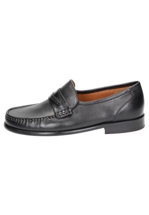 Mocassin en cuir noir pour homme avec couture moc toe et petit talon, présenté en profil latéral sur fond blanc.