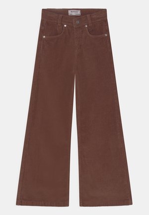 Bruine fluwelen wijde broek met een hoge taille, voorzien van zakken aan de voorkant, een knoopsluiting en een verticale geribbelde structuur over de gehele broek.