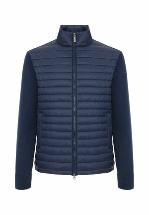 Marineblå quiltet jakke med fuld lynlås foran, ribbede manchetter, opretstående krave og strikkede ærmer.