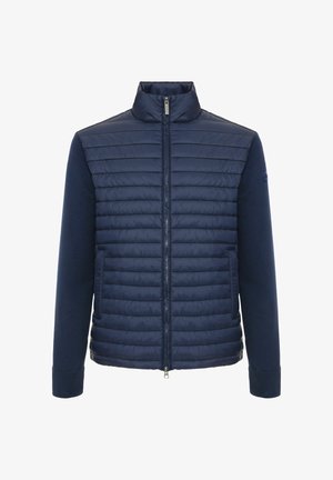 Marineblauw doorgestikt jack met volledige ritssluiting aan de voorkant, geribbelde manchetten, opstaande kraag en gebreide mouwen.