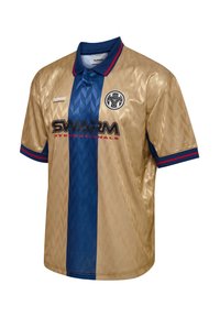 Guld- og blå fodboldtrøje med diamantmønster, korte ærmer og krave. "SWARM"-logo i sort på forsiden. Røde og blå accenter.