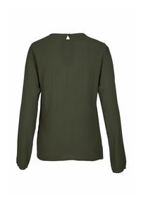 Ilga rankovėla su tamsiai žalia spalva, pagaminta iš lygaus audinio. Turinti mažą atvirą kaklo dalį nugaros pusėje ir paprastą, nenusakomą dizainą.