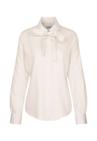 Blusa bianca a righe con colletto a cravatta, chiusura a bottoni, maniche lunghe e orli con polsini caratterizzati da righe strette. Realizzata in un tessuto liscio.