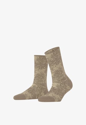 Chaussettes marron à la cheville avec un motif texturé en beige clair, dotées de bouts et talons renforcés pour une meilleure durabilité. Matière en tricot doux.