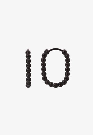 Schwarzer Perlenring und ein vertikaler Stab aus gleichmäßigen schwarzen Perlen; glatte Textur, kreisförmige und gerade Formen mit einer polierten Oberfläche.