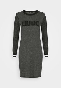 Robe en maille noire et grise à coupe ajustée, avec des manches longues et un col rond. Logo "LIU JO" affiché en évidence sur le devant.