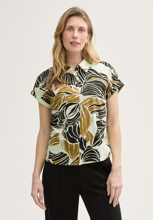 Gombos blúz - neutral cut leaves design