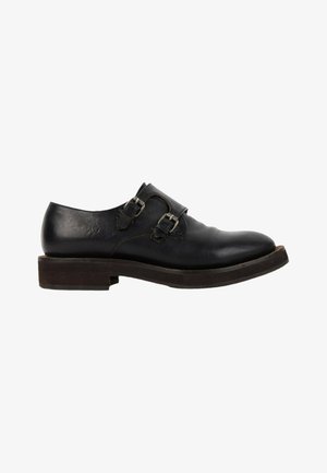 Chaussure habillée noire en cuir pour homme avec boucles à double bride monk et semelle basse marron foncé, vue de côté extérieur.