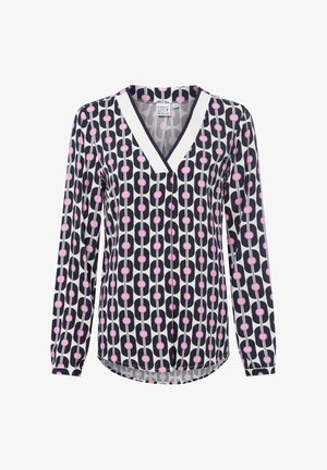 Blouse à manches longues bleu marine avec un motif circulaire rose et blanc, dotée d'un décolleté en V et d'une coupe décontractée. Tissu léger et lisse.