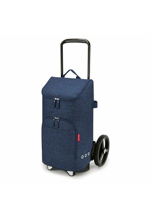 Blauer Stoff-Einkaufswagen mit großen Rädern, Teleskopgriff, vorderen Reißverschlusstaschen und obenliegendem Klappverschluss.