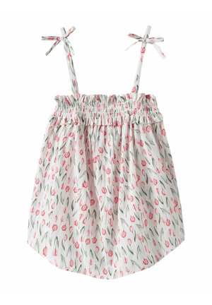 Débardeur floral avec buste smocké, présentant des tulipes roses sur fond blanc, des bretelles réglables et une forme décontractée et fluide.