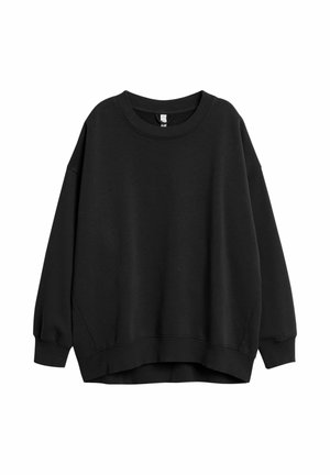 Sort oversized crewneck-sweatshirt med lange ærmer og ribstrikkede manchetter og kant, vist på hvid baggrund.