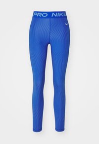 Niebieskie legginsy sportowe z teksturowanym, zygzakowatym wzorem, z niebieskim pasem w talii z białymi napisami "PRO" i "NIKE".