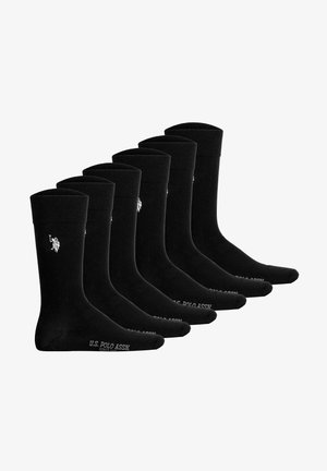 Pack de seis pares de calcetines de algodón negros tipo crew, con puños acanalados y el logo de U.S. Polo Assn. en blanco cerca de la parte superior. Textura suave, diseño clásico.