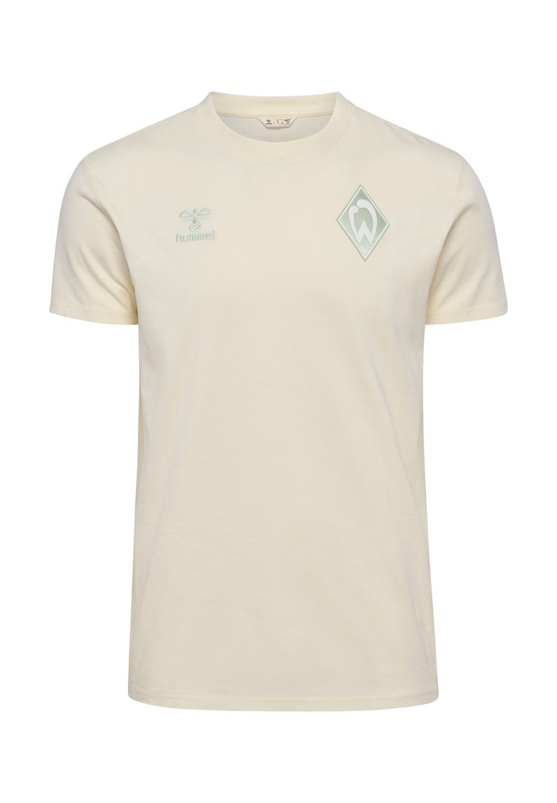 Lys beige bomulds t-shirt med korte ærmer, der har et grønt diamant logo og et lille grønt "hummel" emblem på brystet.