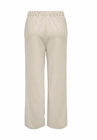 Pantaloni a gamba larga beige con vita elasticizzata, realizzati in un tessuto morbido, caratterizzati da una texture liscia e un design semplice senza tasche.