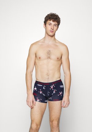 Navyfarbene Boxer-Undershorts mit festlichen rot-weißen Mustern, die Weihnachtsmotive zeigen. Weicher Stoff mit elastischem Bund.
