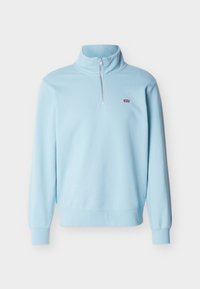 Sweat-shirt bleu clair à manches longues avec demi-fermeture éclair et petit logo rouge Levi’s sur la poitrine gauche, présenté sur un fond blanc uni.
