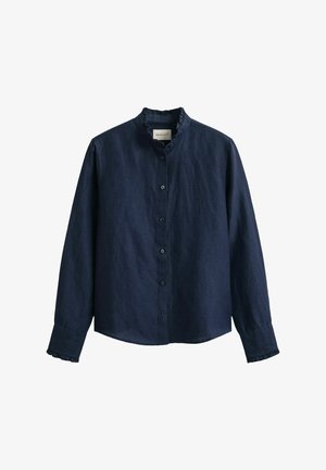 Camicia a maniche lunghe blu navy con bottoni e piccolo colletto alla coreana, rifinita con volant su colletto e polsini.