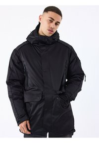 Project X Paris LONGUE MULTIPOCHES - Parka - noir