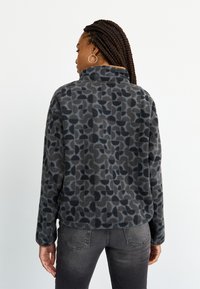 Columbia HELVETIA™ II PRINTED CROPPED HALF SNAP - Suéter de forro polar - black