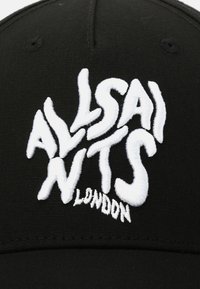 Black baseball cap featuring white embroidered text "ALLSAINTS LONDON" with a distinctive, wavy font design on the front panel.