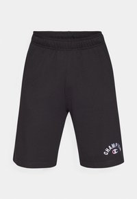 Svarta idrottsshorts i bomull med elastisk midja och en vit "Champion"-logotyp broderad på vänster ben.