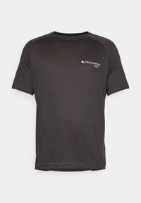 Schwarzes, kurzärmeliges Sportshirt aus leichtem, strukturiertem Stoff. Verfügt über ein kleines weißes Logo auf der Brust und einen runden Halsausschnitt.