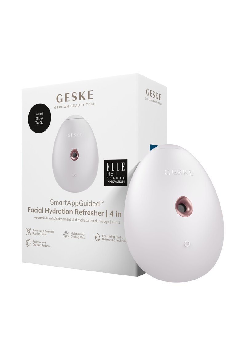 Rafraîchisseur d'hydratation faciale au design ovale. Plastique blanc avec un accent rose doré et un bouton de contrôle. Livré dans une boîte blanche avec un logo.