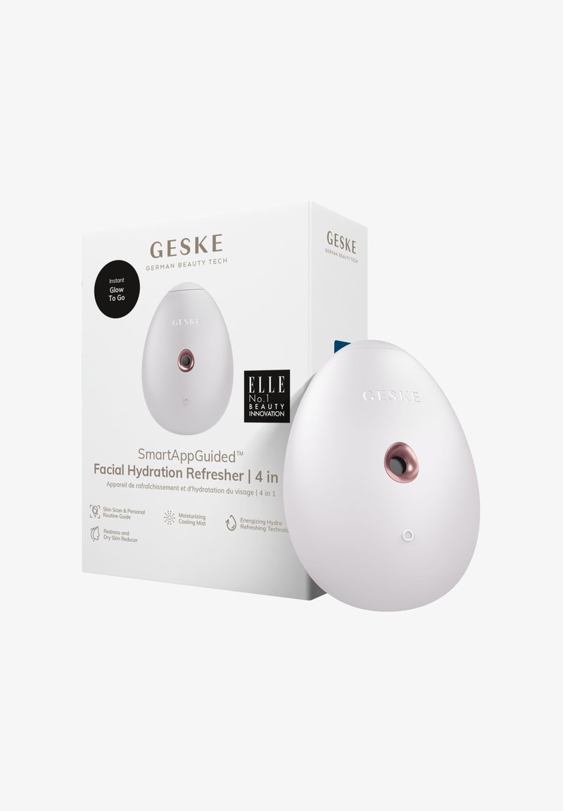 Facial hydration refresher in an oval design. White plastic with a rose gold accent and a control button. Comes in a white box with branding.