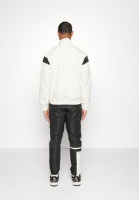 Sergio Tacchini PLUG IN TRACKSUIT - Melegítő - black/vanilla ice/spun sugar