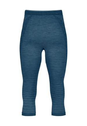 Blue three-quarter length leggings made from a textured, stretchy fabric. Features a smooth waistband and seam detailing on the sides.