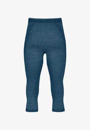Blue three-quarter length leggings made from a textured, stretchy fabric. Features a smooth waistband and seam detailing on the sides.