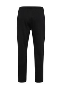 Schwarze Jogginghose aus weichem Material mit einem elastischen Bund und schmal zulaufenden Beinen. Glatte Textur ohne sichtbare Muster oder Akzente.