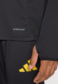 adidas Performance MANCHESTER UNITED EU TRAINING TOP - Vartininko marškinėliai - black/blue/tribe yellow