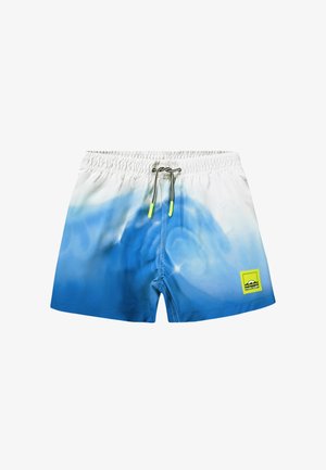 Short de bain dégradé bleu et blanc avec taille élastique, cordon noir et blanc avec embouts jaunes, et patch logo jaune sur la jambe.