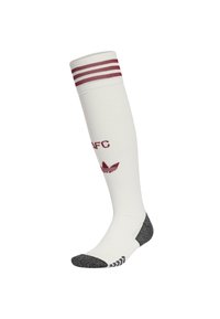 Calzino bianco al ginocchio con strisce rosse in cima. Presenta testo e logo color marrone scuro, e una punta e un tallone grigi con motivo. Materiale morbido.