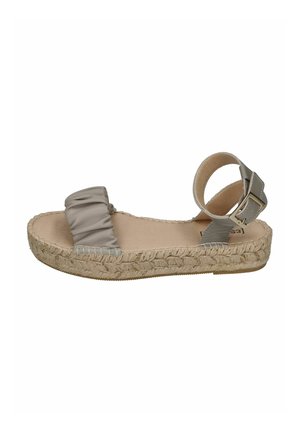 Light gray espadrille sandal with a ruffled fabric strap, woven jute detail along the sole, and a buckle ankle strap. Flat heel design.