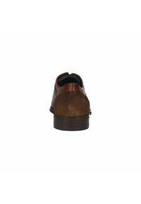 Chaussure en cuir marron avec une finition lisse, une forme arrondie et un talon bas. L'arrière présente une section contrastante plus foncée et une couture subtile.