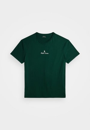 Grünes Baumwoll-T-Shirt mit Rundhalsausschnitt, kurzen Ärmeln und weißem, gesticktem "Ralph Lauren"-Logo auf der Brust. Glatte Textur, einfaches Design.