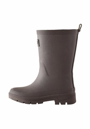 Dark brown rubber rain boot with textured sole, pull tab at the back, and a small side logo tag, shown from the outer side.